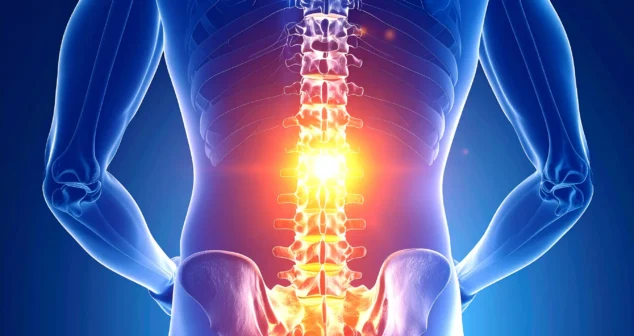 Abstract illustration of the human spine with a glowing focal point in the lumbar region