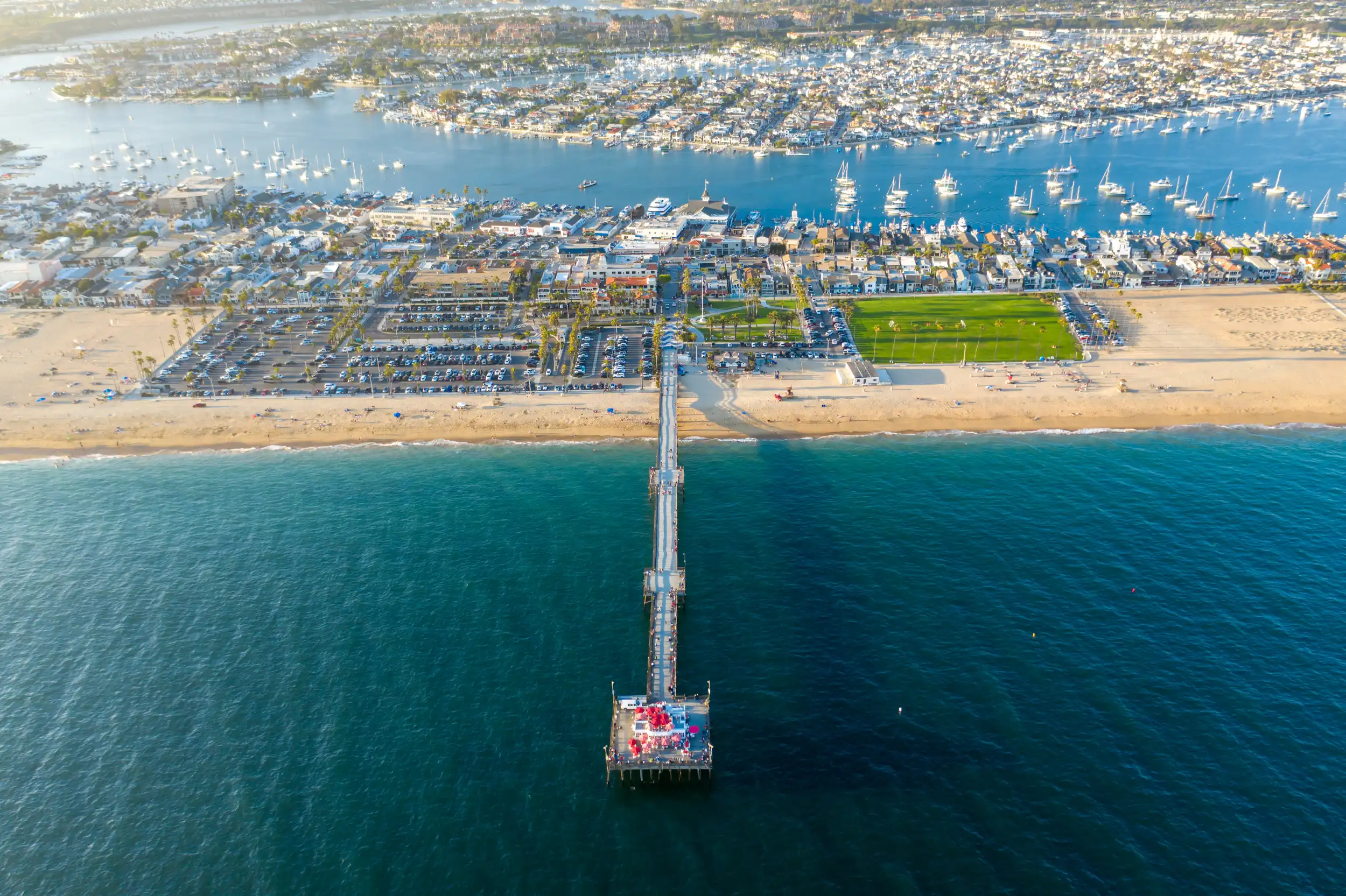 Aerial view of Newport Beach pier and coastline in Orange County, home to StarFish Medical Irvine.