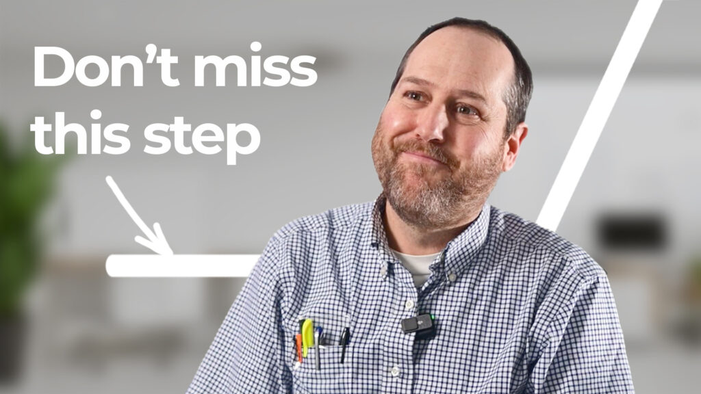 A smiling man with a beard and checkered shirt, sitting in front of a background with the text 'Don't miss this step' and an illustrated arrow pointing downwards.