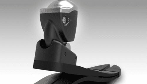 Close-up render of the Kinterra prosthetic ankle showing the hydraulic mechanism, pivot hardware, and carbon fiber foot blade.