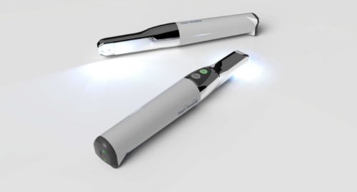 Rendered image of two handheld intraoral scanners with metallic tips and ergonomic white housings used for capturing dental impressions.