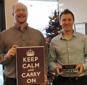 John and Christian display their awards in front of the 2014 StarFish Christmas tree. 