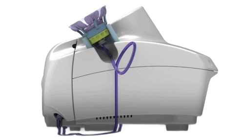 Rendered side view of the HALO Breast Pap Test device showing the main housing, tubing and breast cup assemblies.