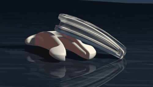 Rendered scleral implant components displayed on a reflective surface showing curved implant geometry and placement profile.