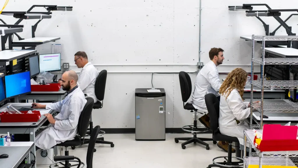 Medical device pilot manufacturing workspace showing engineers supporting NPI and scalable production
