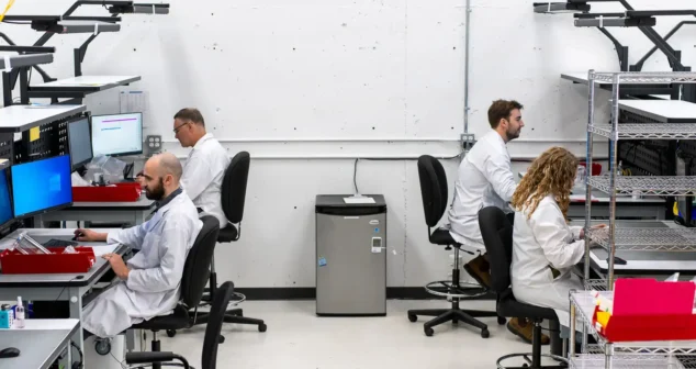 Medical device pilot manufacturing workspace showing engineers supporting NPI and scalable production