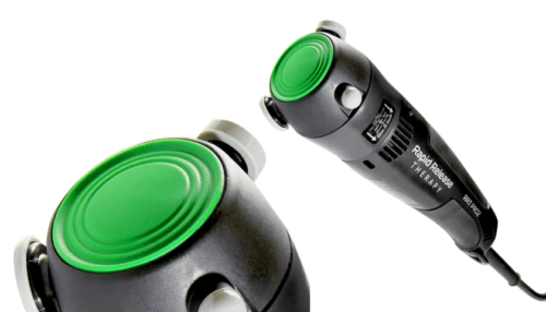 Side view of the Rapid Release PRO2 device with black housing and green treatment head illustrating ergonomic design and treatment interface.