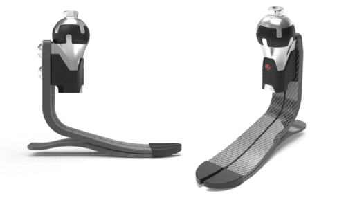 Rendered image of two ShockWave Spherical Shock Unit prosthetic feet showing carbon fiber blades and cylindrical shock modules.