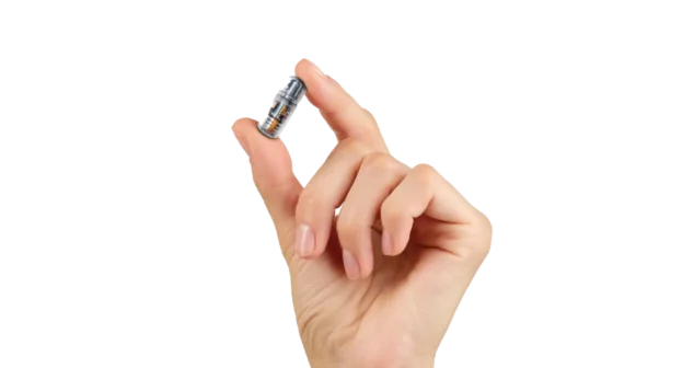 hand holding a unit of the progenity ingestible capsule