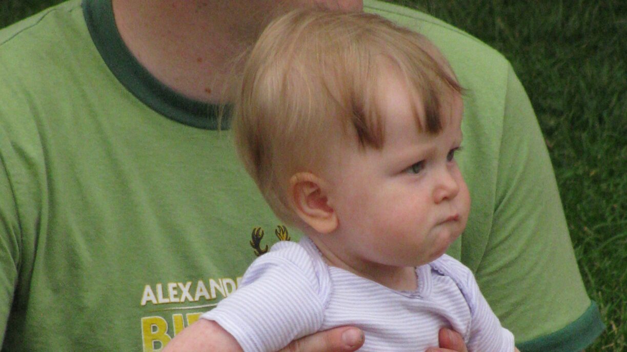 New Beginning, New Design Author holds daughter at company picnic (2012)