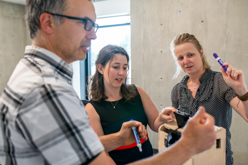 StarFish Medical design team collaborating on a surgical device prototype during a development workshop