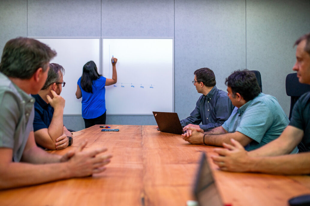 Boardroom with person presenting