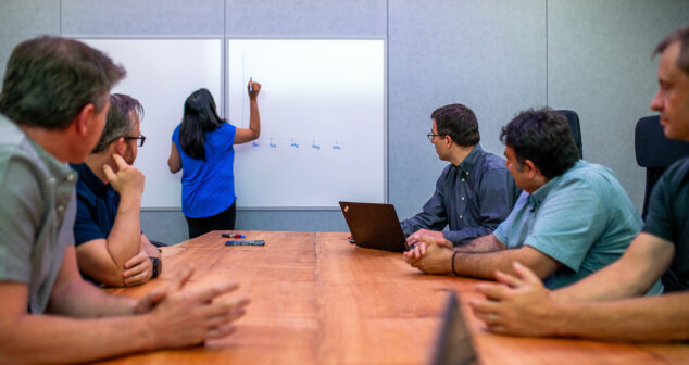 Boardroom with person presenting