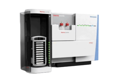 Rendered image of the cartridge carrier positioned beside the ThermoFisher VeriSpray ion source instrument for automated lab workflows.