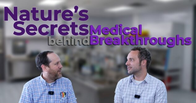 Two professionals in plaid shirts and microphones engage in a discussion in a laboratory setting. The text overlay reads "Nature's Secrets Behind Medical Breakthroughs," emphasizing the role of natural discoveries in driving advancements in healthcare and biotechnology.