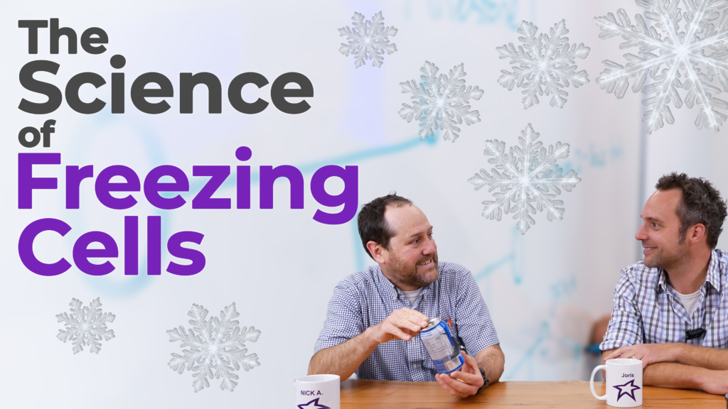 Two men sit at a table in a discussion, with one holding a frozen soda can. The background features a whiteboard with faint writing, and snowflake graphics are scattered around the image. The text overlay reads, "The Science of Freezing Cells" in bold black and purple letters.