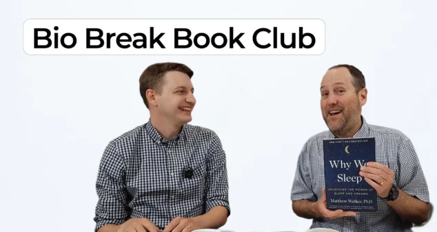 Nick Allan and Nigel Syrotuck smiling during a Bio Break Book Club episode. Nigel holds the book Why We Sleep by Matthew Walker.