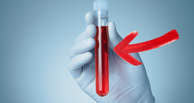 Gloved hand holding a test tube filled with red liquid, with a large red arrow pointing at the tube on a blue gradient background.