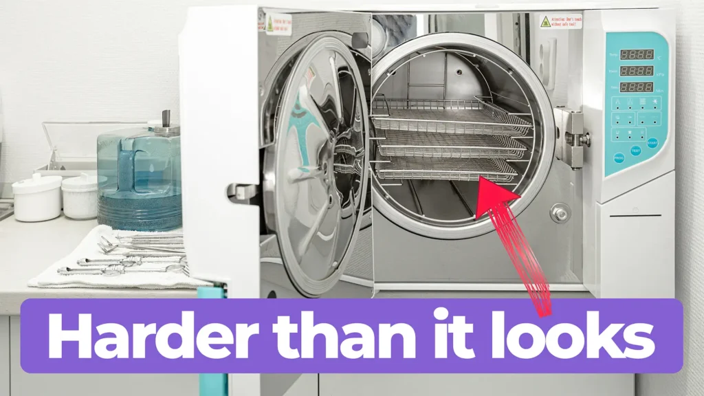 Open autoclave with medical instrument trays inside during medical device cleaning and sterilization process