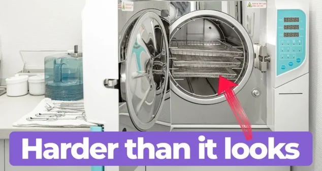 Open autoclave with medical instrument trays inside during medical device cleaning and sterilization process