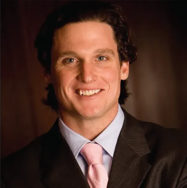 Headshot of Ryan Jones, co-founder of MicroPharma and VP at Progenity