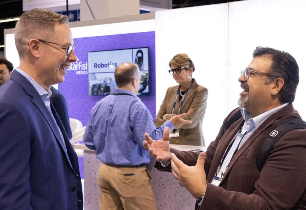 StarFish Medical team engaging with attendees at The MedTech Conference, showcasing expertise in complex medical device design and development.